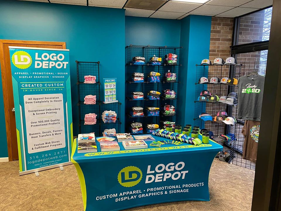 Logo Depot WIchita Kansas Apparel, Promotional, Design, display graphics and signage. Created custom in-house since 1938. Hats, coozies, bags, shirts, pens.